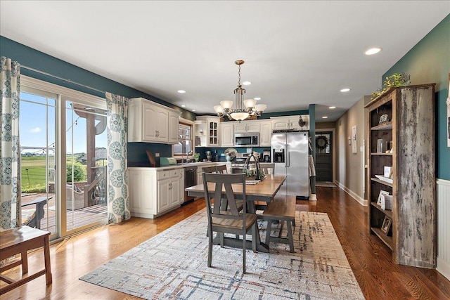 27425 S Steven Ray Dr, Monee, IL 60449 - dining room featuring a chandelier, wood finished floors, and recessed lighting