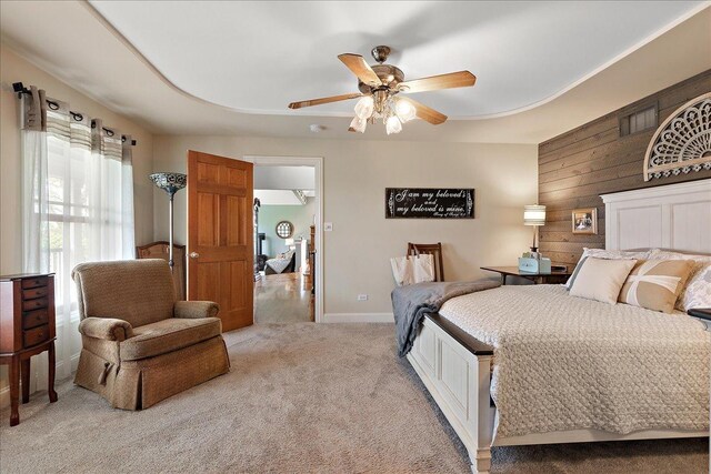 27425 S Steven Ray Dr, Monee, IL 60449 - bedroom with light colored carpet, wooden walls, and a ceiling fan