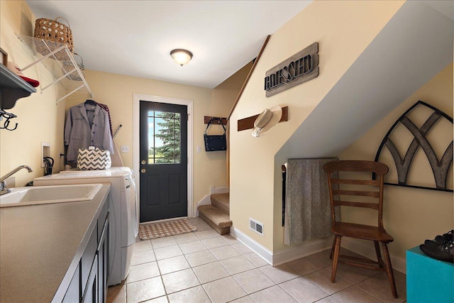 27425 S Steven Ray Dr, Monee, IL 60449 - laundry room with independent washer and dryer and light tile patterned floors