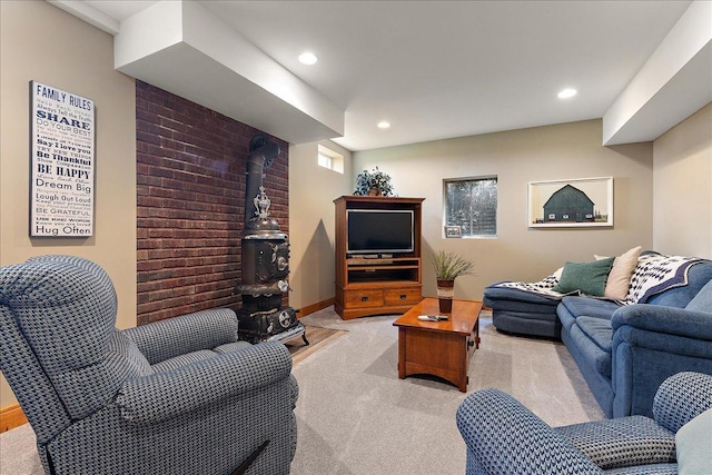 27425 S Steven Ray Dr, Monee, IL 60449 - living room with light colored carpet, recessed lighting, and a wood stove