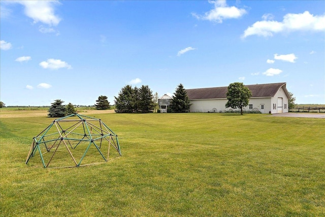 27425 S Steven Ray Dr, Monee, IL 60449 - view of green lawn with a garage