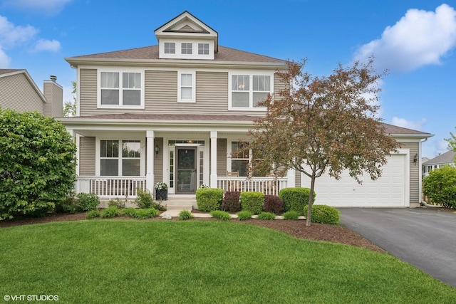 2363 Trailside Ln, Wauconda, IL 60084 - american foursquare style home with asphalt driveway, a front yard, a porch, and a shingled roof