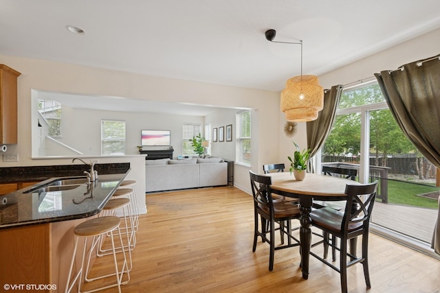 2363 Trailside Ln, Wauconda, IL 60084 - dining room with light wood-style flooring and healthy amount of natural light