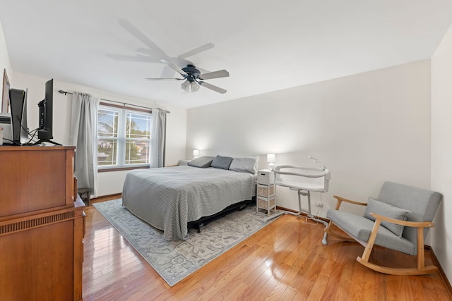 1191 Narragansett Dr, Carol Stream, IL 60188 - bedroom with wood finished floors, a ceiling fan, and baseboards
