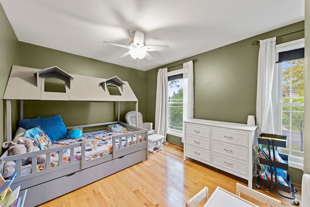1191 Narragansett Dr, Carol Stream, IL 60188 - bedroom with multiple windows, light wood-type flooring, and a ceiling fan