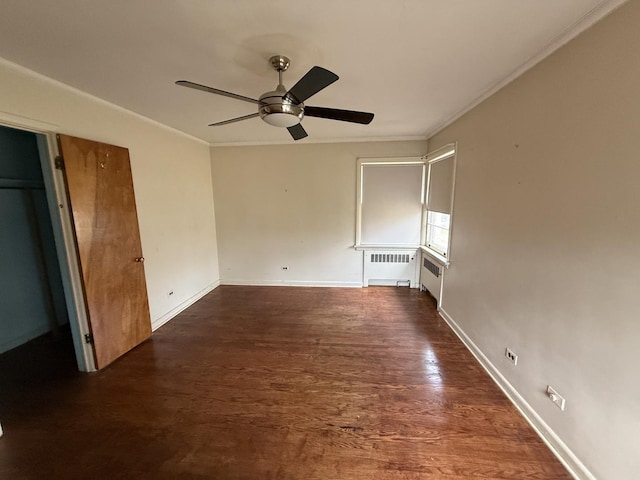 1850 Garland Ave, Highland Park, IL 60035 - unfurnished bedroom featuring radiator, ornamental molding, dark wood-style floors, baseboards, and a ceiling fan