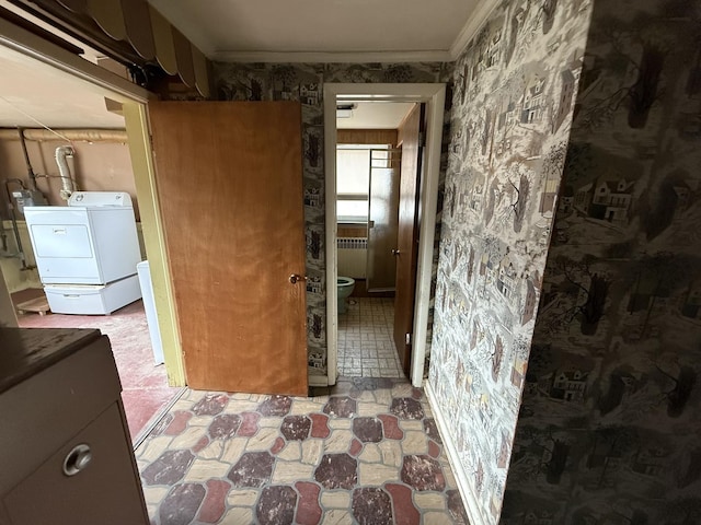 1850 Garland Ave, Highland Park, IL 60035 - hall featuring washing machine and clothes dryer, radiator, wallpapered walls, and crown molding