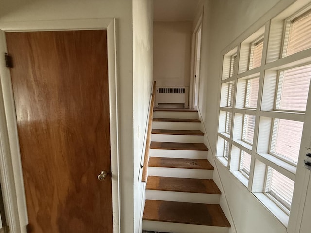 1850 Garland Ave, Highland Park, IL 60035 - stairway with healthy amount of natural light and radiator heating unit