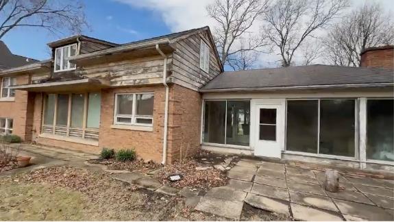 1850 Garland Ave, Highland Park, IL 60035 - back of property featuring a patio, a chimney, and brick siding
