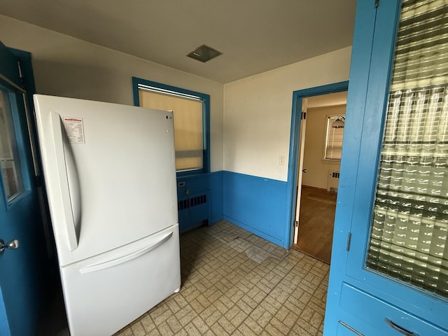 1850 Garland Ave, Highland Park, IL 60035 - corridor with radiator heating unit and brick patterned floors
