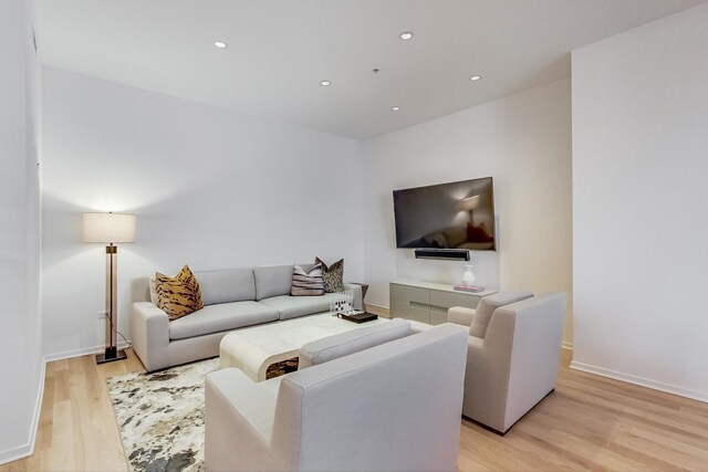 500 W Superior St Unit 612, Chicago, IL 60654 - living area featuring light wood-style floors, recessed lighting, and baseboards