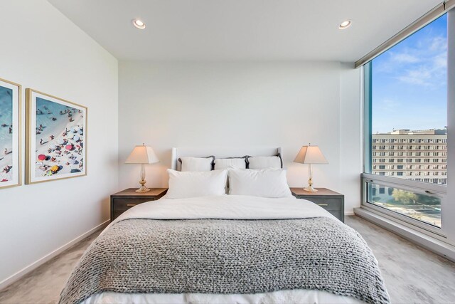 500 W Superior St Unit 612, Chicago, IL 60654 - bedroom featuring recessed lighting, baseboards, and light colored carpet