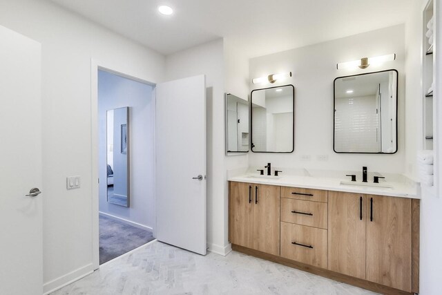 500 W Superior St Unit 612, Chicago, IL 60654 - bathroom with double vanity, baseboards, and recessed lighting