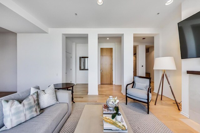 500 W Superior St Unit 612, Chicago, IL 60654 - living area featuring light wood-type flooring and recessed lighting
