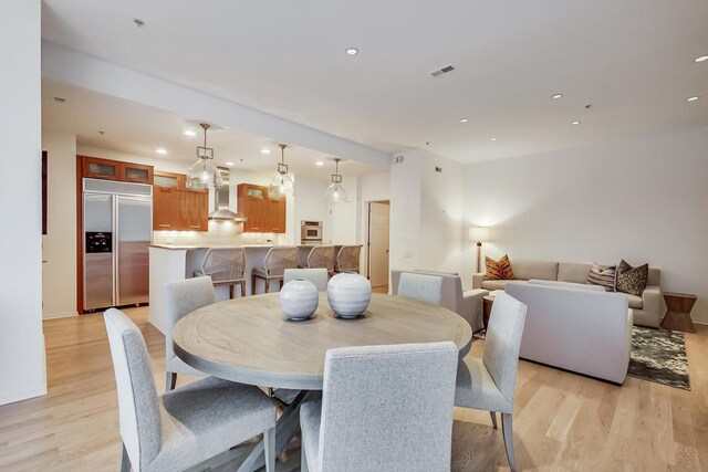 500 W Superior St Unit 612, Chicago, IL 60654 - dining area with light wood finished floors and recessed lighting