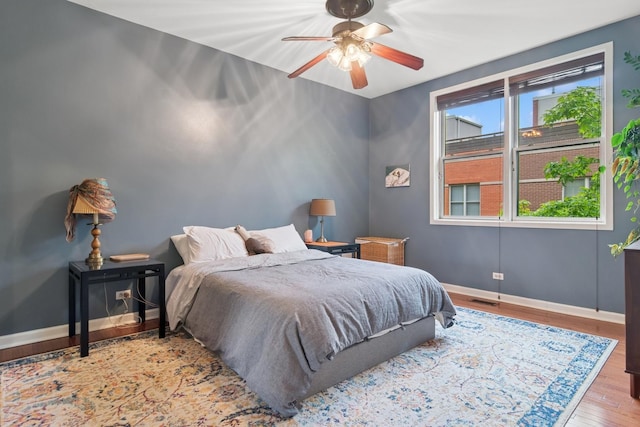 1012 S Loomis St Unit F, Chicago, IL 60607 - bedroom with wood finished floors, baseboards, and ceiling fan