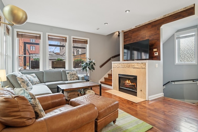 1012 S Loomis St Unit F, Chicago, IL 60607 - living area with plenty of natural light, wood finished floors, recessed lighting, a fireplace, and stairway