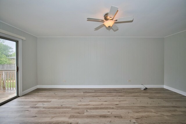 7410 162nd St, Tinley Park, IL 60477 - unfurnished room with wood finished floors, baseboards, ceiling fan, and ornamental molding