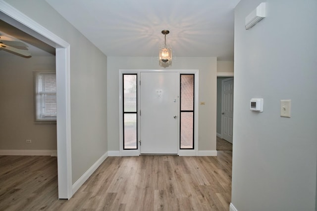 7410 162nd St, Tinley Park, IL 60477 - foyer featuring light wood finished floors, baseboards, and ceiling fan