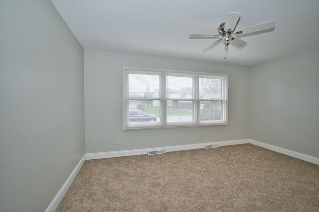 7410 162nd St, Tinley Park, IL 60477 - empty room with carpet floors, ceiling fan, and baseboards