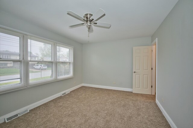 7410 162nd St, Tinley Park, IL 60477 - unfurnished room with carpet floors, baseboards, and a ceiling fan