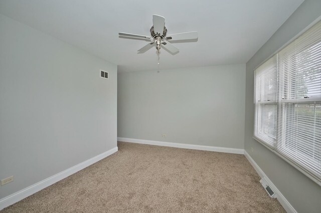 7410 162nd St, Tinley Park, IL 60477 - carpeted spare room with a ceiling fan and baseboards