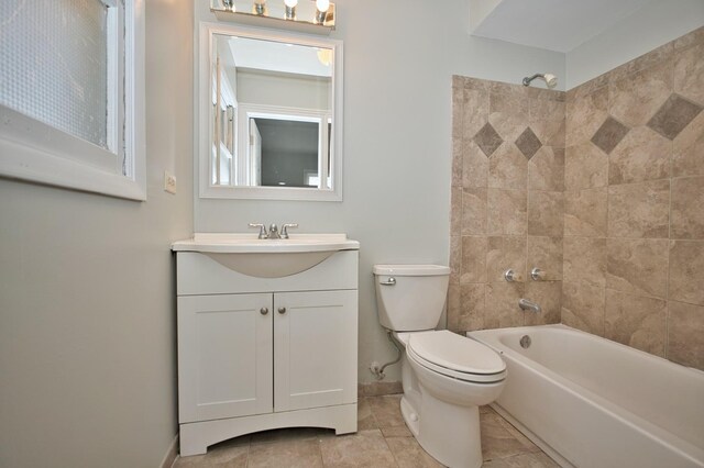 7410 162nd St, Tinley Park, IL 60477 - bathroom featuring vanity, baseboards, toilet, shower / bath combination, and tile patterned flooring