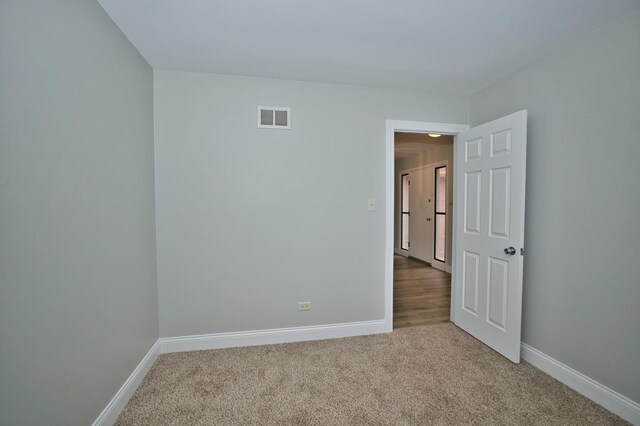 7410 162nd St, Tinley Park, IL 60477 - empty room with carpet floors and baseboards