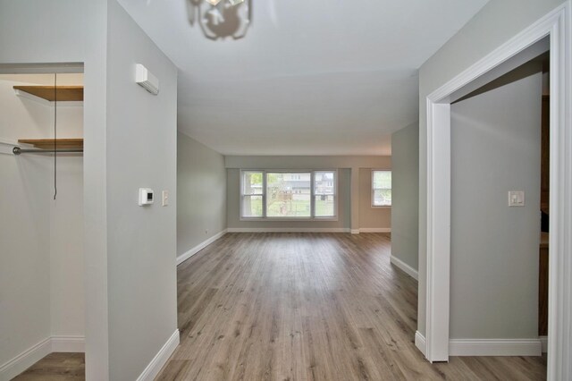 7410 162nd St, Tinley Park, IL 60477 - corridor with light wood-style flooring and baseboards