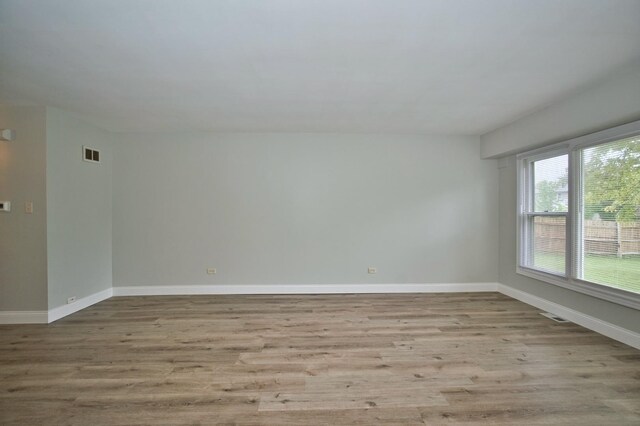 7410 162nd St, Tinley Park, IL 60477 - empty room featuring baseboards and wood finished floors