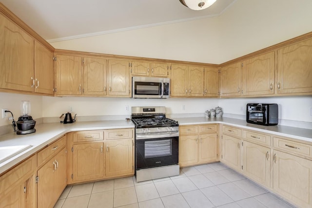 1347 Rainbow Cir, Manteno, IL 60950 - kitchen with appliances with stainless steel finishes, light tile patterned flooring, and light countertops