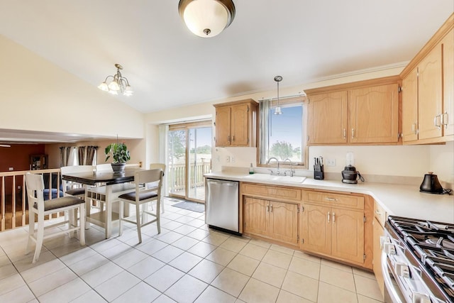 1347 Rainbow Cir, Manteno, IL 60950 - kitchen with appliances with stainless steel finishes, a sink, light countertops, a chandelier, and lofted ceiling