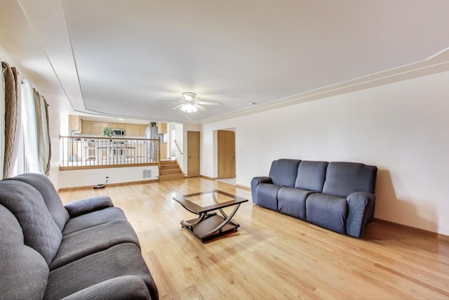 1347 Rainbow Cir, Manteno, IL 60950 - living area with wood finished floors, baseboards, and ceiling fan