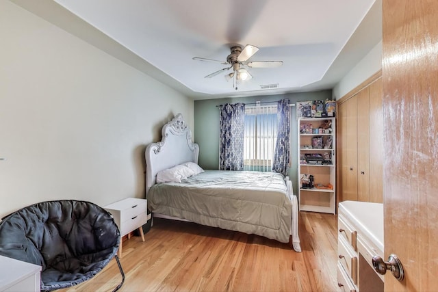 1347 Rainbow Cir, Manteno, IL 60950 - bedroom featuring light wood finished floors and ceiling fan