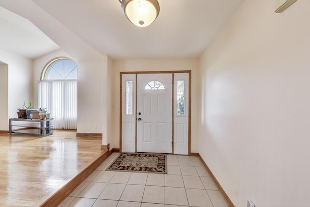 1347 Rainbow Cir, Manteno, IL 60950 - foyer featuring baseboards and light tile patterned floors