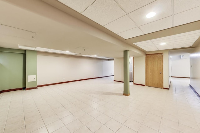 1347 Rainbow Cir, Manteno, IL 60950 - finished below grade area featuring a drop ceiling, baseboards, and recessed lighting
