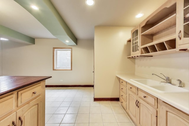 1347 Rainbow Cir, Manteno, IL 60950 - kitchen with a sink, baseboards, light brown cabinets, open shelves, and recessed lighting