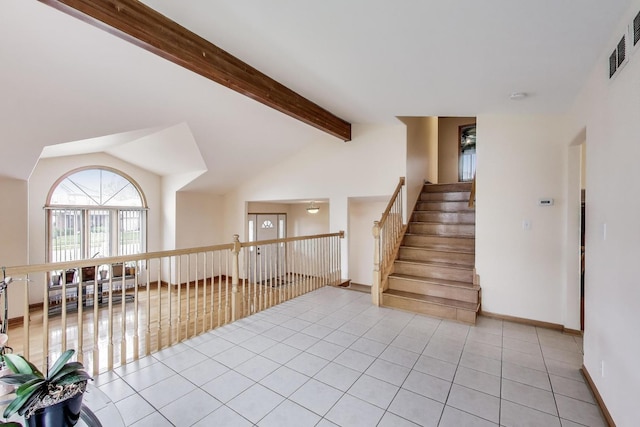 1347 Rainbow Cir, Manteno, IL 60950 - hall with light tile patterned flooring, baseboards, and stairway