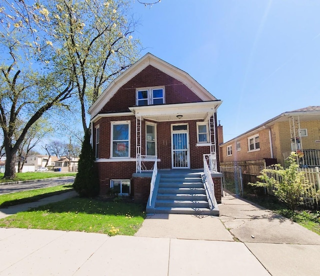 6801 S Oakley Ave, Chicago, IL 60636 - view of front facade with brick siding and covered porch
