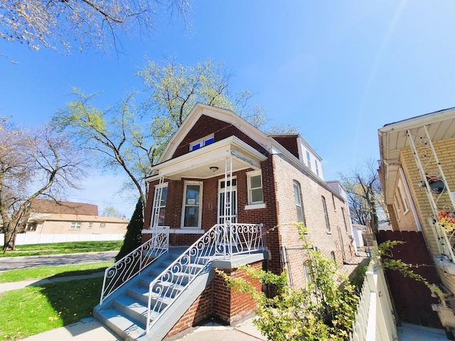 6801 S Oakley Ave, Chicago, IL 60636 - view of front of house with brick siding and covered porch