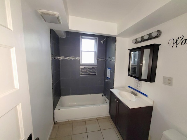 6801 S Oakley Ave, Chicago, IL 60636 - bathroom featuring tile patterned floors, vanity, shower / bath combination, and baseboards