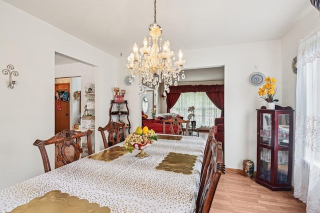 21705 W Knollwood Ct, Plainfield, IL 60544 - dining space with a chandelier and light wood-type flooring
