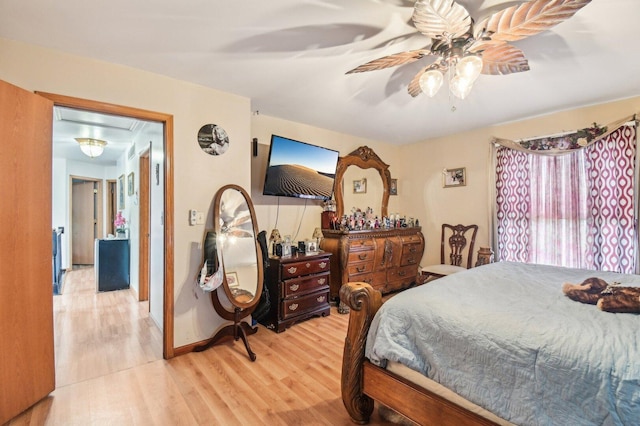 21705 W Knollwood Ct, Plainfield, IL 60544 - bedroom with attic access, light wood finished floors, a ceiling fan, and baseboards