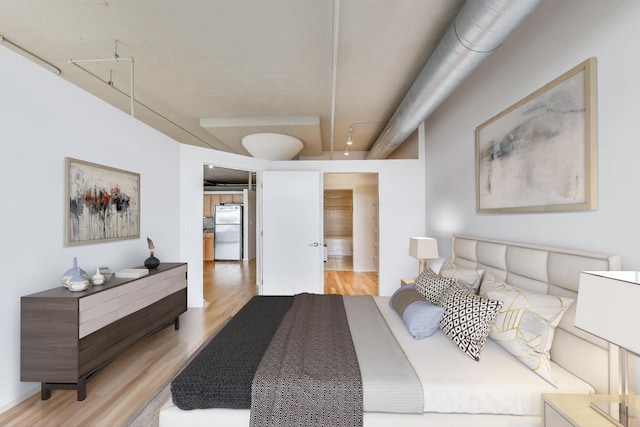 1525 S Sangamon St Unit 312, Chicago, IL 60608 - bedroom with freestanding refrigerator and light wood-type flooring