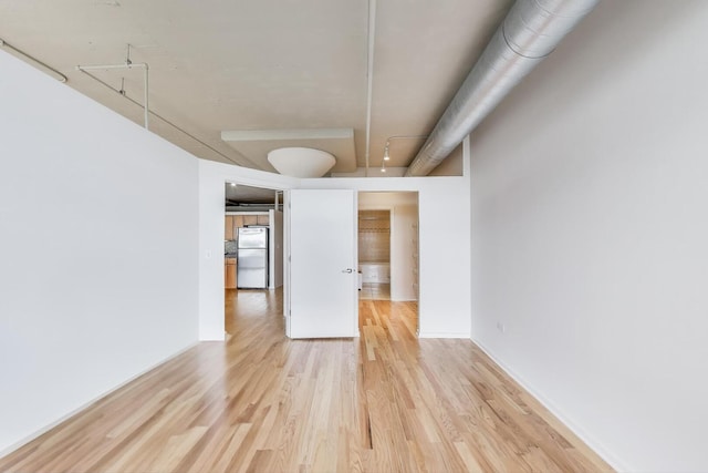 1525 S Sangamon St Unit 312, Chicago, IL 60608 - spare room featuring light wood-type flooring