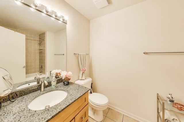 1525 S Sangamon St Unit 312, Chicago, IL 60608 - bathroom featuring tile patterned floors, toilet, and vanity