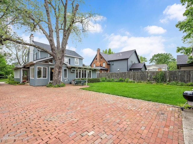671 Euclid Ave, Glen Ellyn, IL 60137 - rear view of property with a patio