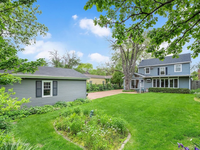 671 Euclid Ave, Glen Ellyn, IL 60137 - view of green lawn featuring a patio