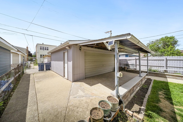 view of outbuilding featuring a gate