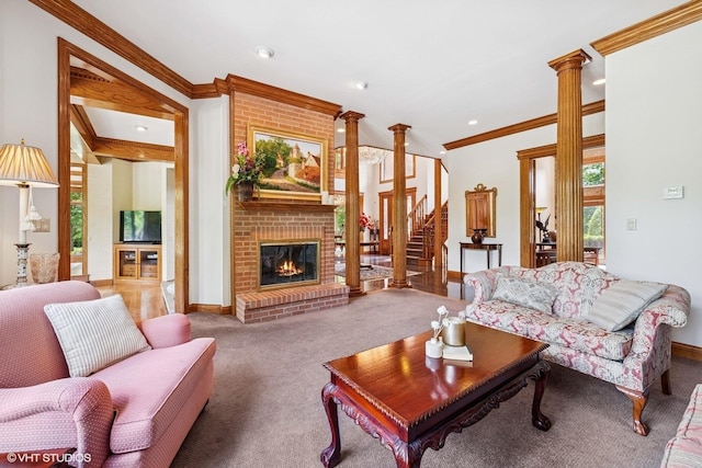 3 Shoreside Dr, South Barrington, IL 60010 - carpeted living area with ornamental molding, stairway, a brick fireplace, decorative columns, and recessed lighting